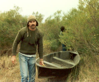 Joe's younger brother Buck pulling a pirogue.