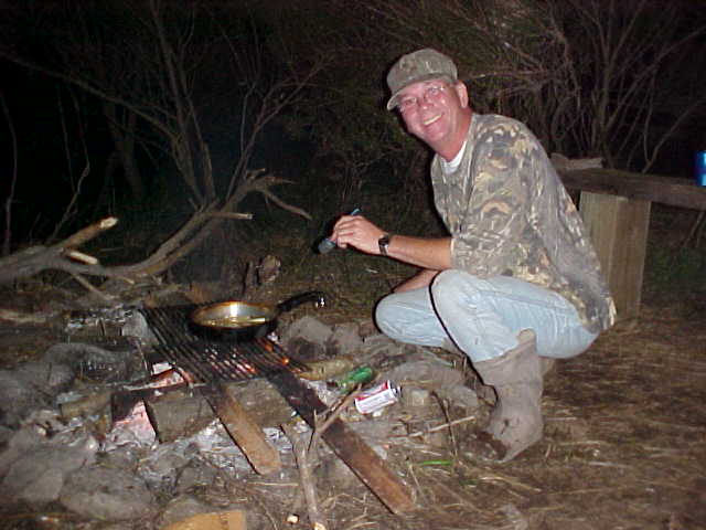 Master chef Buck cooking up the evening meal.