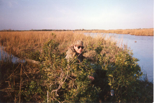 Joe sitting in a makeshift blind on the back cut.