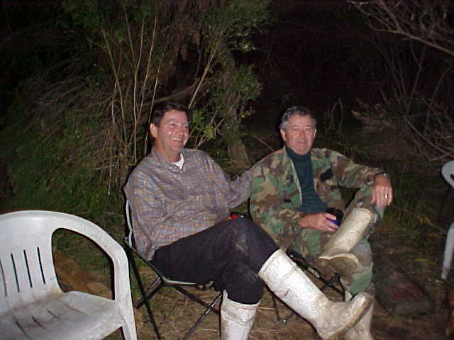 Joe and Dick relaxing at the camp site.